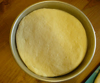 Take a pan, roll out the dough and let stand half an hour in the oven with the light turned on.