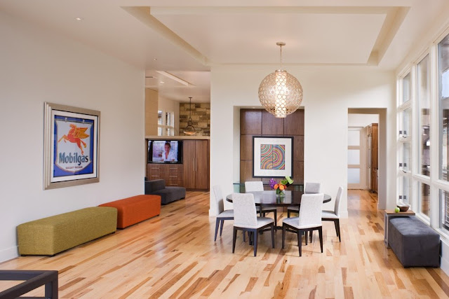 Photo of large modern dining room interiors with oak wood floor