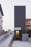 Shiga Narrow Urban Promenade House Design With Concrete Walls And Upper Bridge