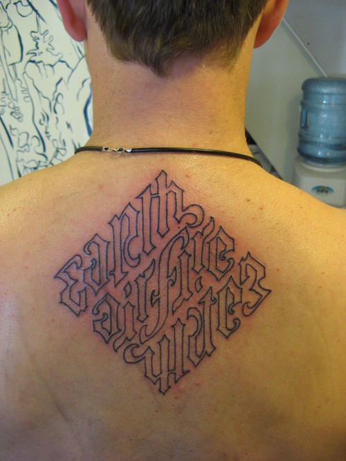 Amazingly cool ambigram tattoo.