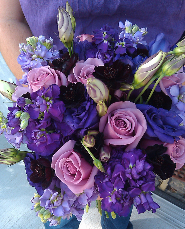 purple bridal bouquet A lovely clutch bouquet of stock lisianthus 