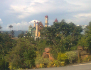 . but notice a fantasy Medieval castle standing majestically by the road. (fantasy world castle passing view from diokno highway from tagaytay)