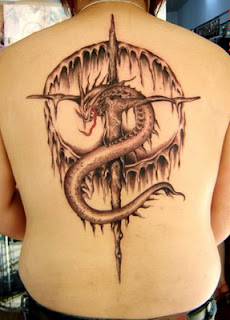 Dragon tattoo and  cross tattoo