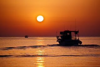 fishing boats, sunset