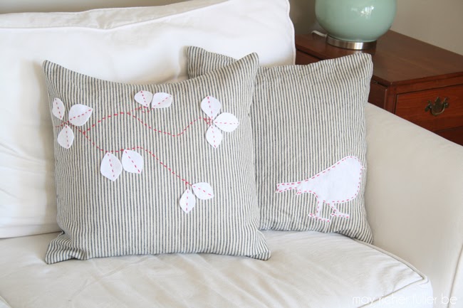 appliqued bird silhouette and fall leaves pillows