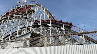 Coney Island Cyclone Train Going Over Airtime Hill Roller Coaster Luna Park