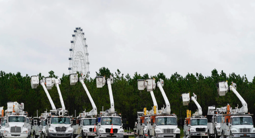 Utility trucks are staged near the Orange County Convention center, ahead of Hurricane Ian on Wednesday in Orlando, Florida. (Photo: John Raoux/Associated Press)