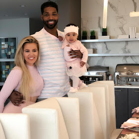 Khloe with partner Tristan and baby True