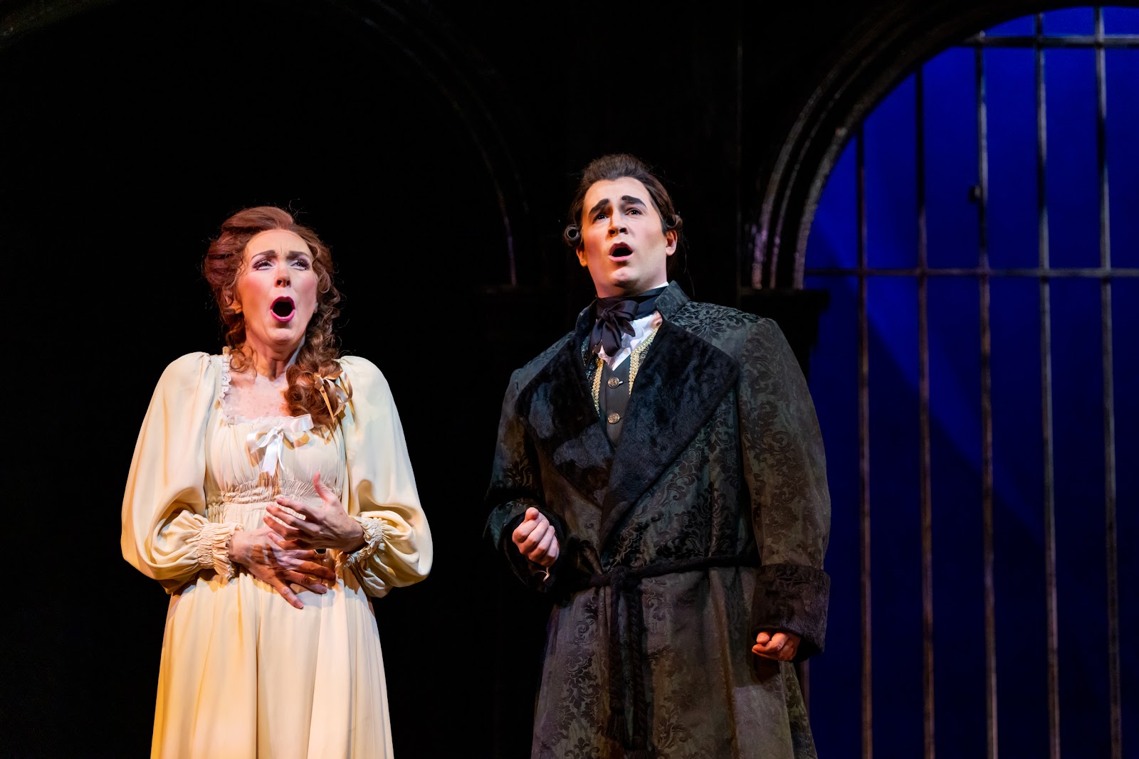 IN REVIEW: soprano MARY DUNLEAVY as Donna Anna (left) and tenor ALEX MCKISSICK as Don Ottavio (right) in North Carolina Opera's January 2023 production of Wolfgang Amadeus Mozart's DON GIOVANNI [Photograph by Eric Waters Photography, © by North Carolina Opera]