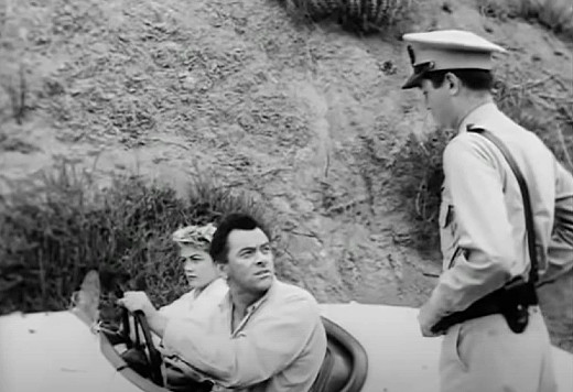 Roger Corman in an uncredited role as a state trooper, The Fast and the Furious, 1954
