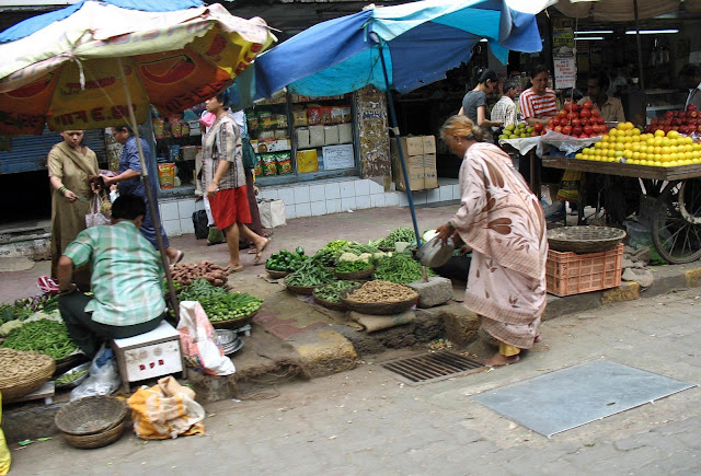 vegetable sellers on pavement