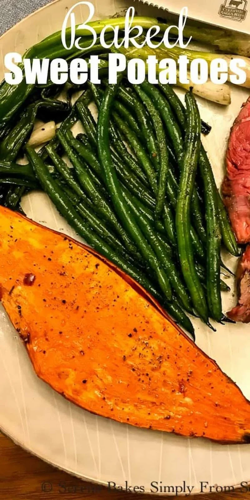 A down shot of a Baked Sweet Potato with sliced steak and green beans on a light blue plate with white text at the top Baked Sweet Potatoes.