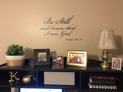 Scripture stencil above desk of Psalm 46:10