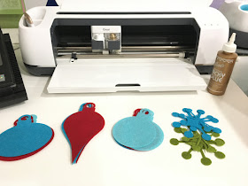 Add a touch of MidCentury Modern flair with a felt retro tree skirt and gingerbread house ornaments using Cricut Maker.