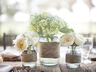 Soft green hydrangea and garden roses create a soft fluffy