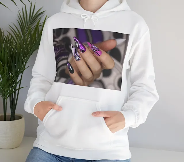 A Women Hoodie With Manicure on Long Nails With Dots and Lines