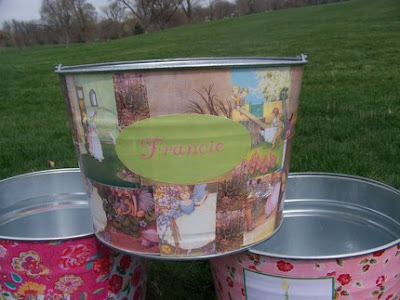 bucket with fairies, perched on 2 other buckets