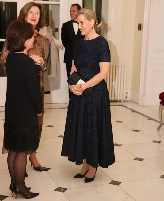 The Duchess of Edinburgh wore a Metallic midi dress by Alaia. Pomegranate London drop stone earrings
