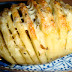 Sliced Baked Potatoes with Herbs and Cheese