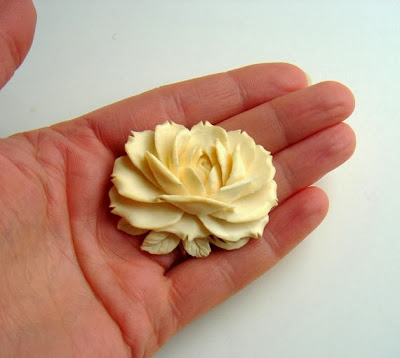 https://www.etsy.com/listing/168609168/vintage-ox-bone-hand-carved-rose-brooch?ref=favs_view_3