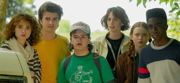 Stranger Things characters Eleven, Mike, and Hopper