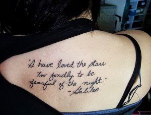 a tattoo of girl with quotation 