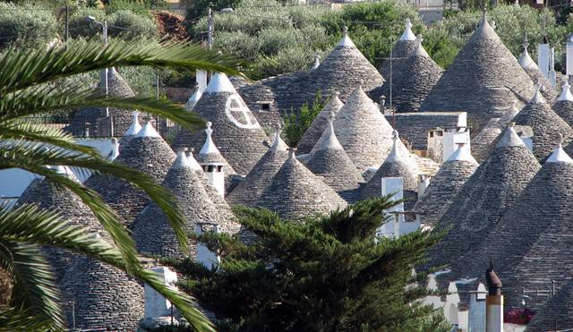 Alberobello, the city of drystone dwellings known as trulli , is an exceptional example of vernacular architecture. It is one of the best preserved and most homogeneous urban areas of this type in Europe. Its special features, and the fact that the buildings are still occupied, make it unique. It also represents a remarkable survival of prehistoric building techniques.