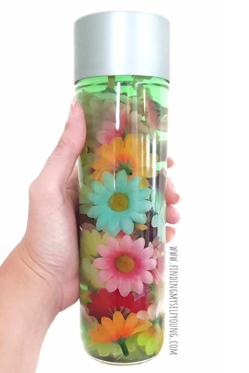 spring sensory bottle with flowers.