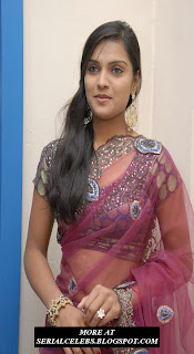 Prakruthi in transparent saree