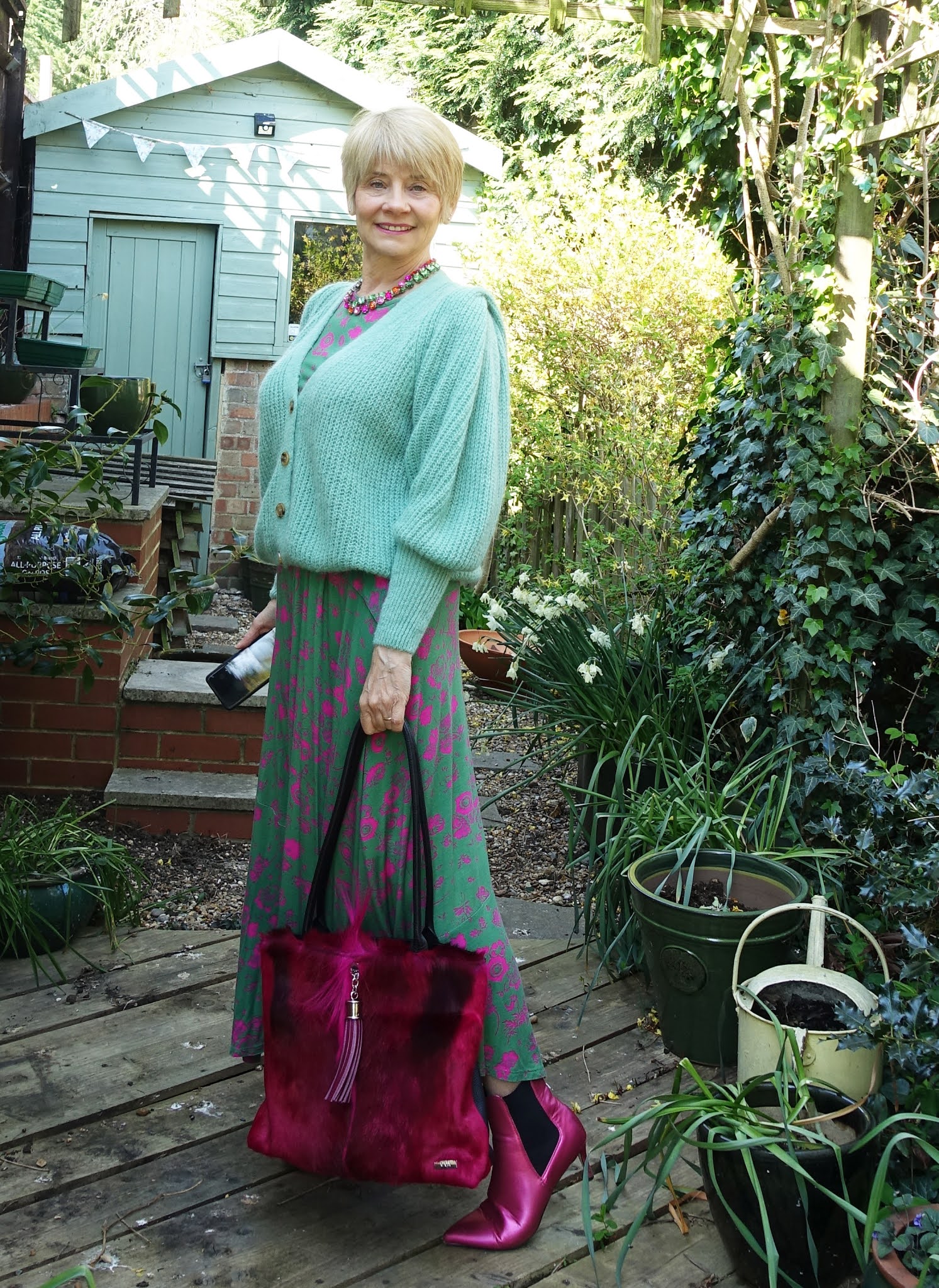 For the Style Not Age Challenge Spring Sweaters Is This  Mutton blogger Gail Hanlon chooses a mohair blend cardigan in green to wear over a green and pink dress, perfect for cooler spring days