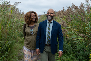 Erika Alexander stars as Coraline and Jeffrey Wright as Thelonious "Monk" Ellison in writer/director Cord Jefferson’s AMERICAN FICTION An Orion Pictures Release Photo credit: Claire Folger © 2023 Orion Releasing LLC. All Rights Reserved.