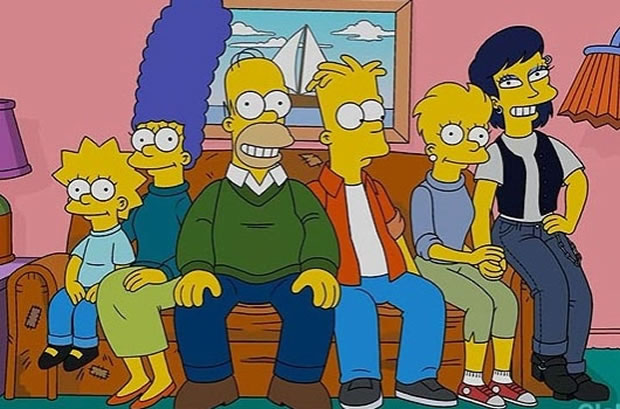 Lisa (à direita) posa para foto de família ao lado de namorada (Foto: Reprodução)