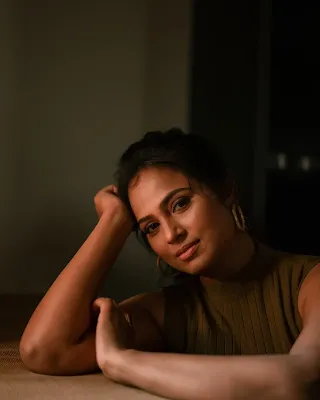 Ramya Pandian smiles candidly in a chic pastel outfit during her photoshoot