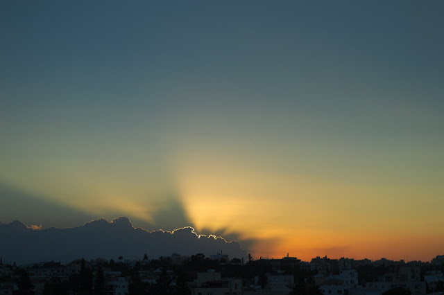 Sunset in Nicosia, Cyprus over the buildings.