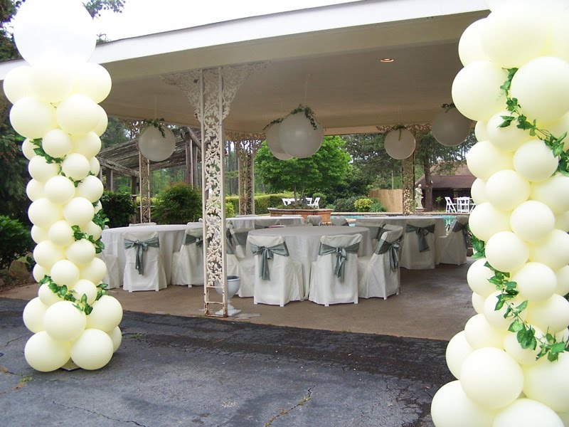 One of the best outdoor wedding decorating ideas is the ceremony arch