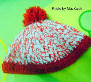 http://www.mazkwok.com/2012/08/free-crochet-pattern-baby-hat-with.html