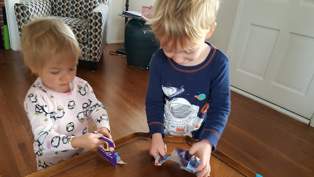 toddlers-opening-presents-chocolates