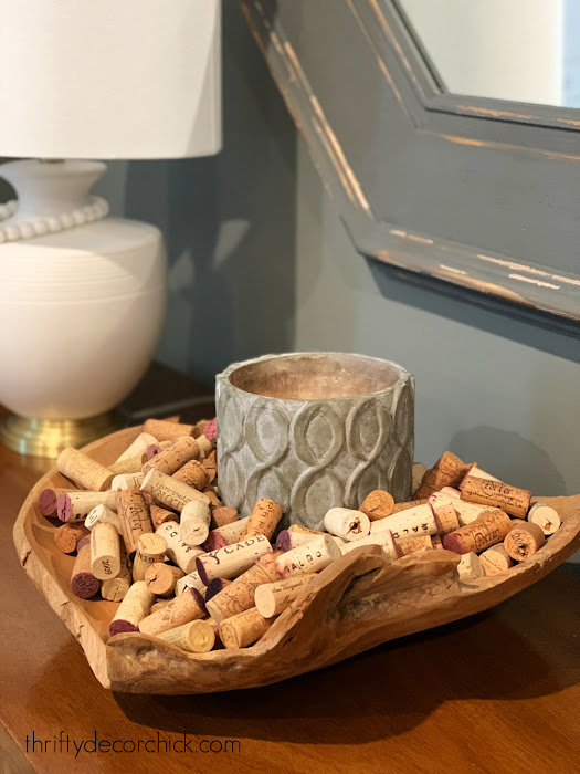 wine corks wood bowl and candle