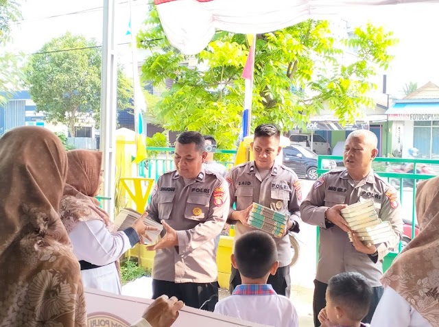 Polres Berau Bagikan Buku dan Sosialisasi Kamtibmas di Paud Tegal Sari