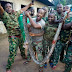 Nigerian Soldiers Pose With Huge Python After Capturing It. Photos