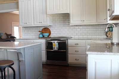 Kithcen remodel with custom cabinets, beveled subway tile and Cambria Berwyn quartz