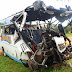 Buses crash head-on killing 18 in holiday toll