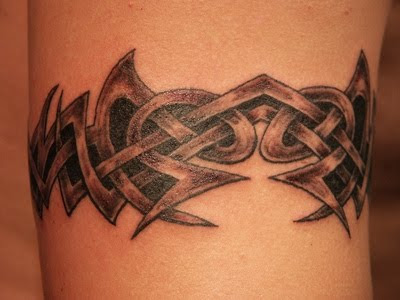 Tribal Armband tattoos are popular for men as well as popular with women 