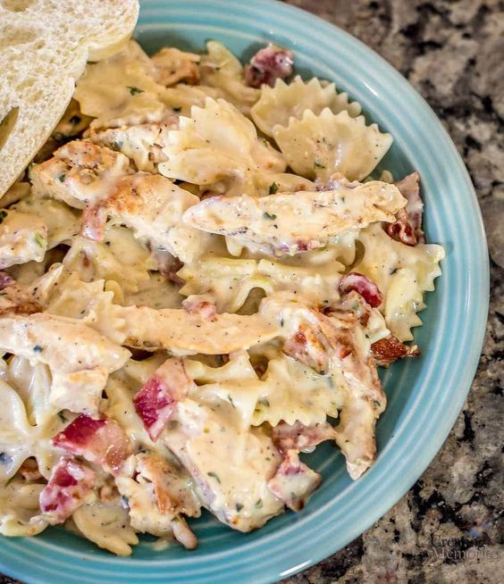 A mouthwatering combination of creamy alfredo, chicken, and bacon in a hearty pasta dish