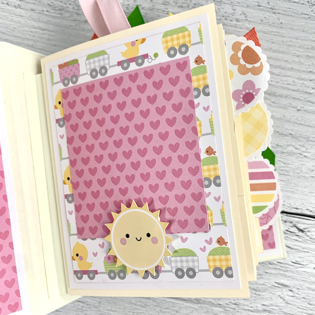 Baby Girl Scrapbook Mini Album Page with train, hearts, & sunshine