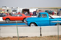 The orange car that later dropped its rear end