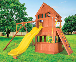 Treehouse with slide and climbing wall