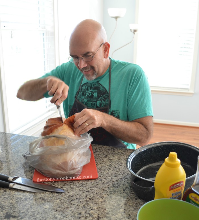 Hubby cutting up ham