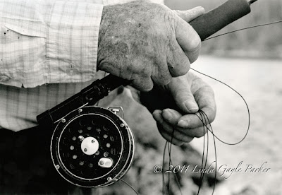 2D, dad, hands, fly fishing pole, fishing line, river, beach, rocks, Stillaguamish, closeup