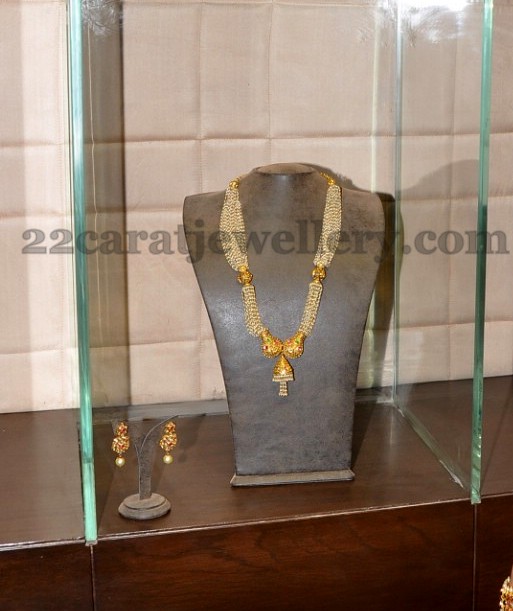 Pearls Set with Gold Jhumka Locket